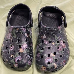 Black/floral crocs. Never worn.